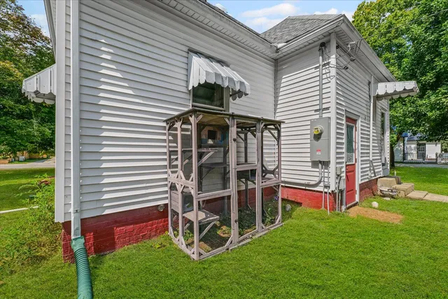 a picture of a bathroom with a picture of a white wall