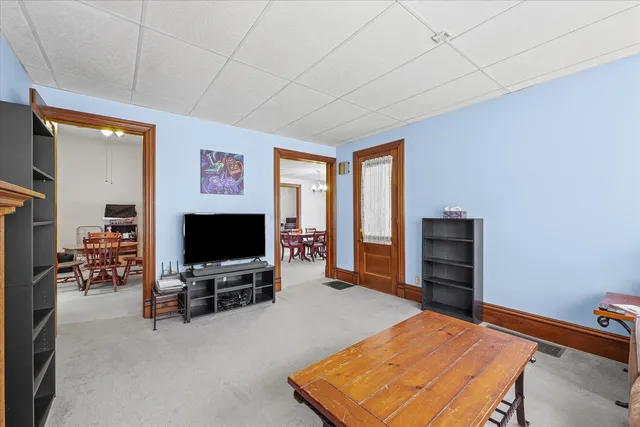 a room with furniture and a flat screen tv