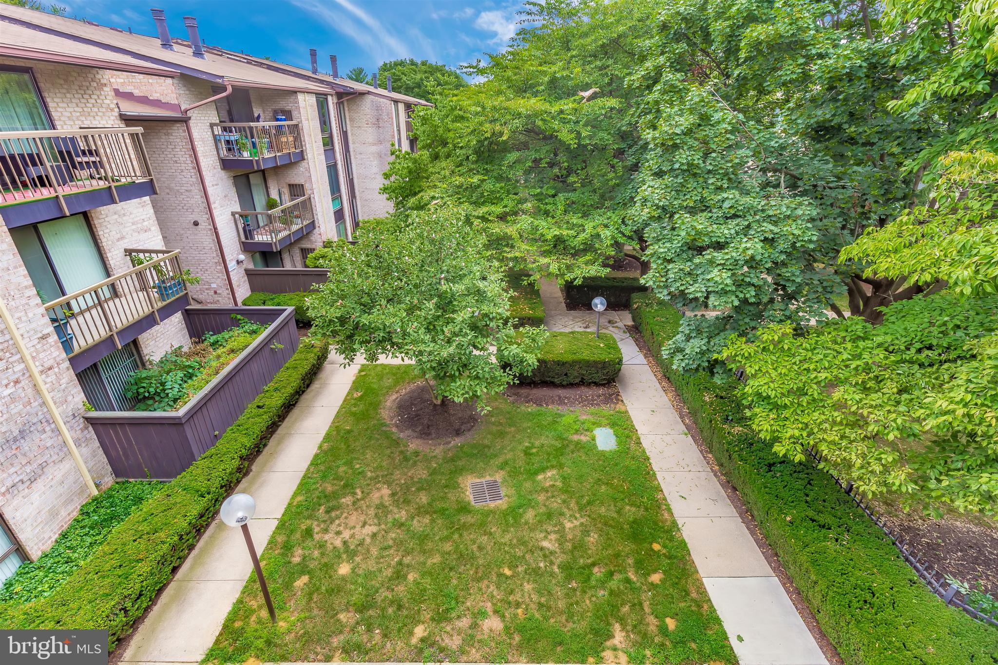 10006 Stedwick Road, Unit 304 Gaithersburg, MD 20886 - Photo 39 of 43 Spacious Balcony Overviewing the Garden