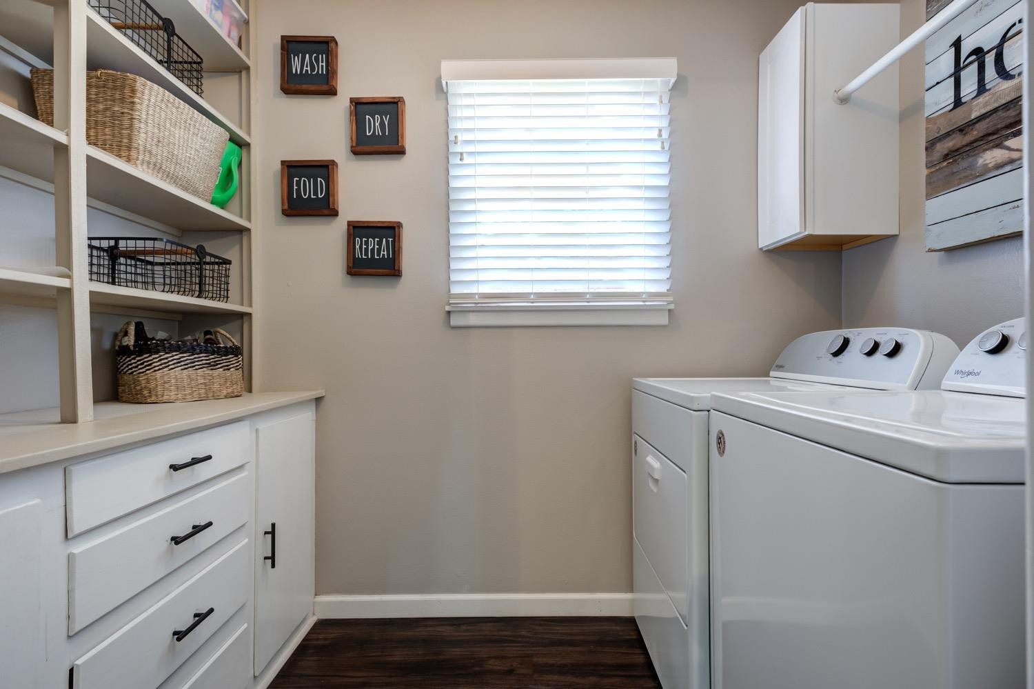 2306 61st Street Lubbock, TX 79412 - Photo 21 of 35 a utility room with closet dryer and washer