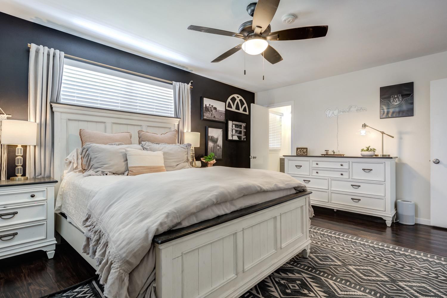 2306 61st Street Lubbock, TX 79412 - Photo 23 of 35 a bedroom with bed and window