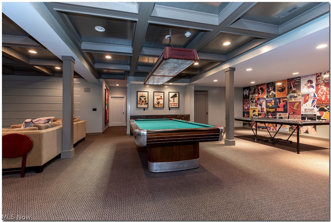 10 Pepper Ridge Road Cleveland, OH 44124 - Photo 26 of 34 The well-planned lower level is finished with primo care and attention to detail. There's space for pool, ping pong and watching TV.
