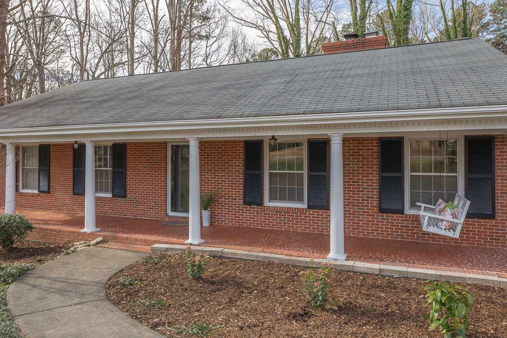 8913 Hunting Trail Raleigh, NC 27613 - Photo 2 of 19 The rocking chair front porch is a great way to greet guests and to enjoy the breeze on your swing! Front Porch