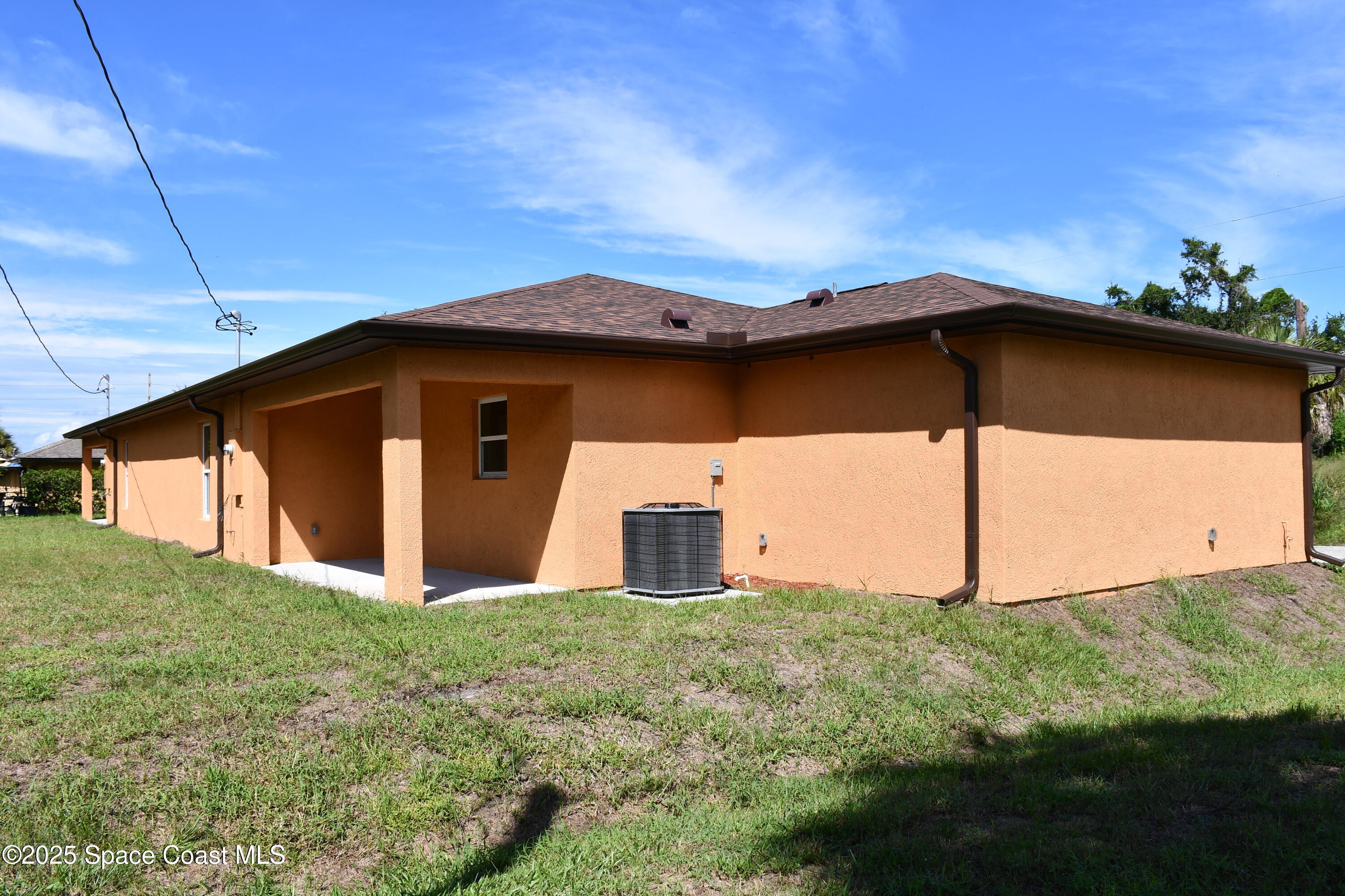 1515 Furnari Street Cocoa, FL 32922 - Photo 3 of 14 a view of a house with backyard