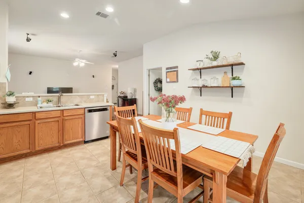 a view of a dining room with furniture