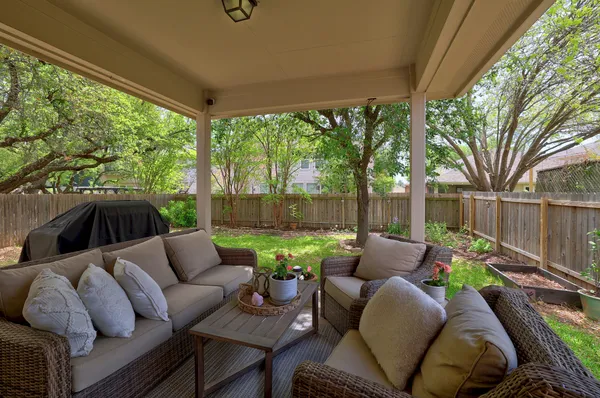 a outdoor living space with furniture and garden view