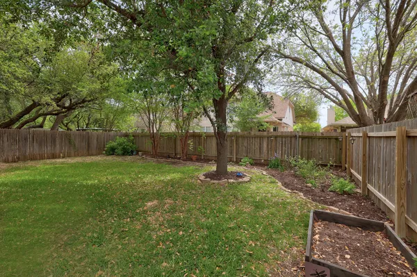 a view of a backyard with a slide