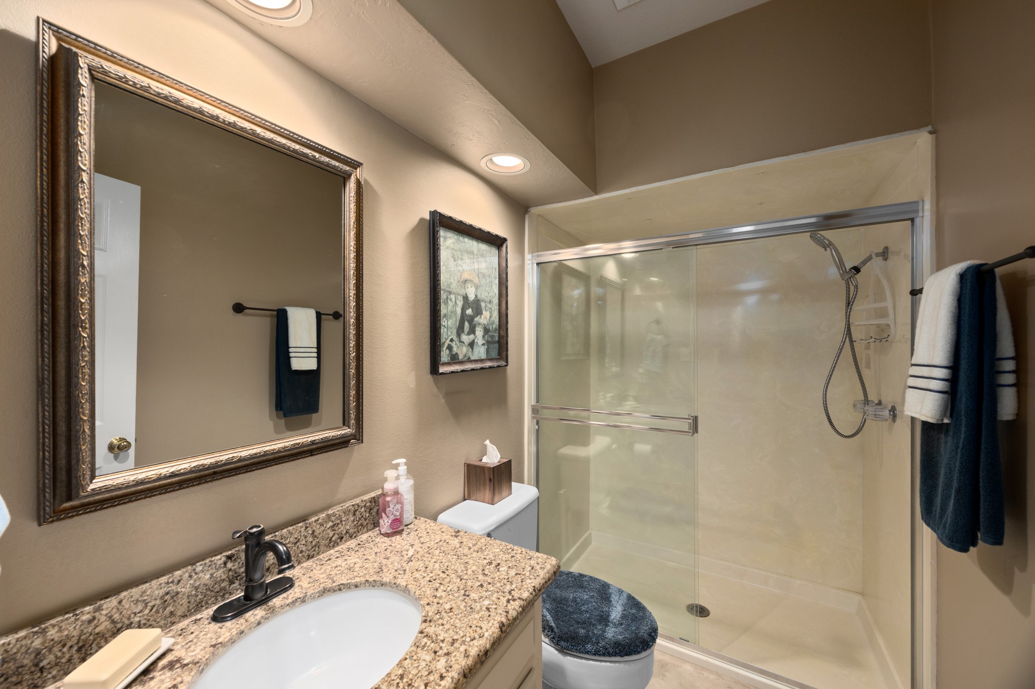8807 Chelmsford Lane Spring, TX 77379 - Photo 20 of 50 At the end of the back hallway near the 3 car garage is a full bathroom.