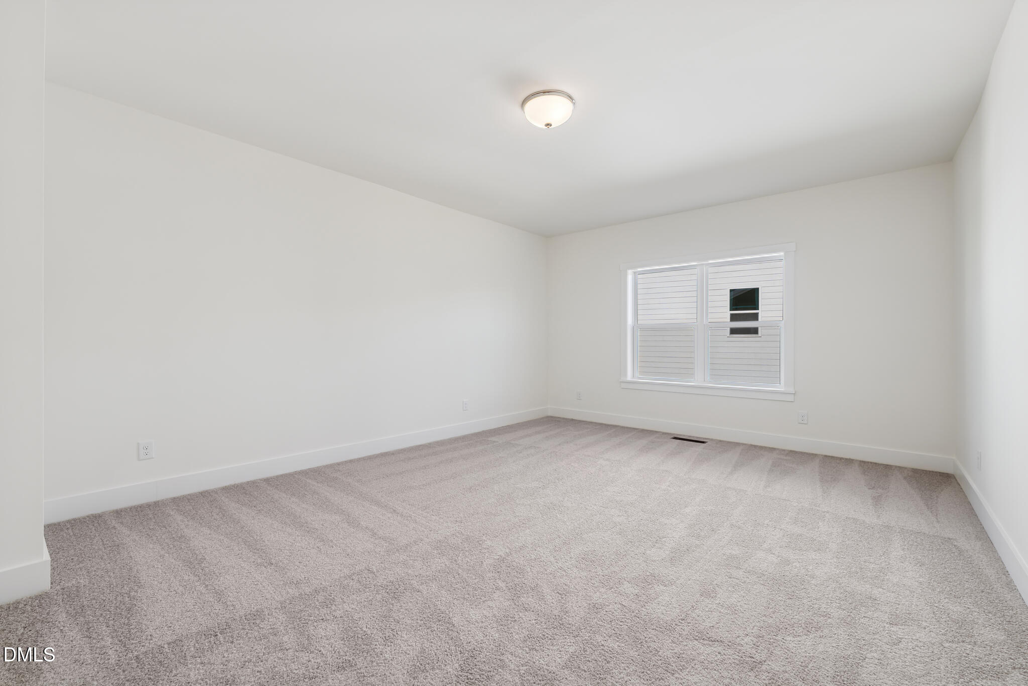 1213 Opal Lane Durham, NC 27705 - Photo 18 of 50 an empty room with a window