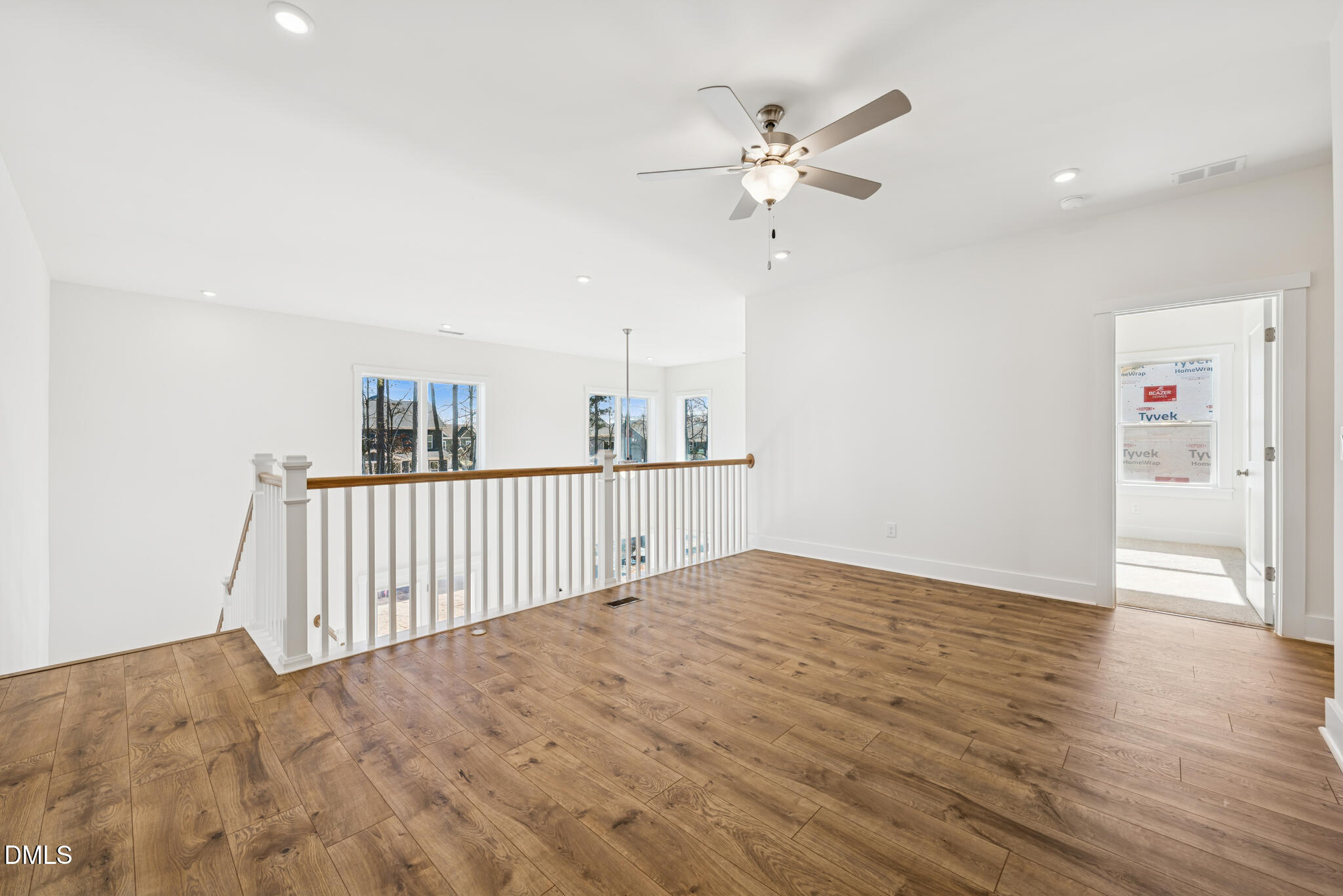 1213 Opal Lane Durham, NC 27705 - Photo 19 of 50 a view of an empty room and wooden floor