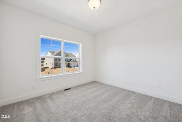 a bathroom with a sink vanity granite tub shower and a mirror