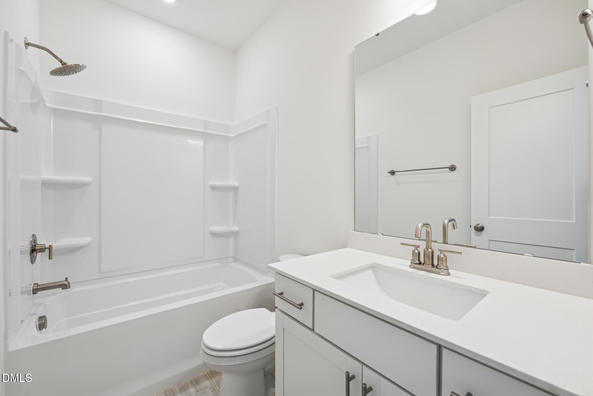 1213 Opal Lane Durham, NC 27705 - Photo 29 of 50 a bathroom with a sink a toilet and a bathtub