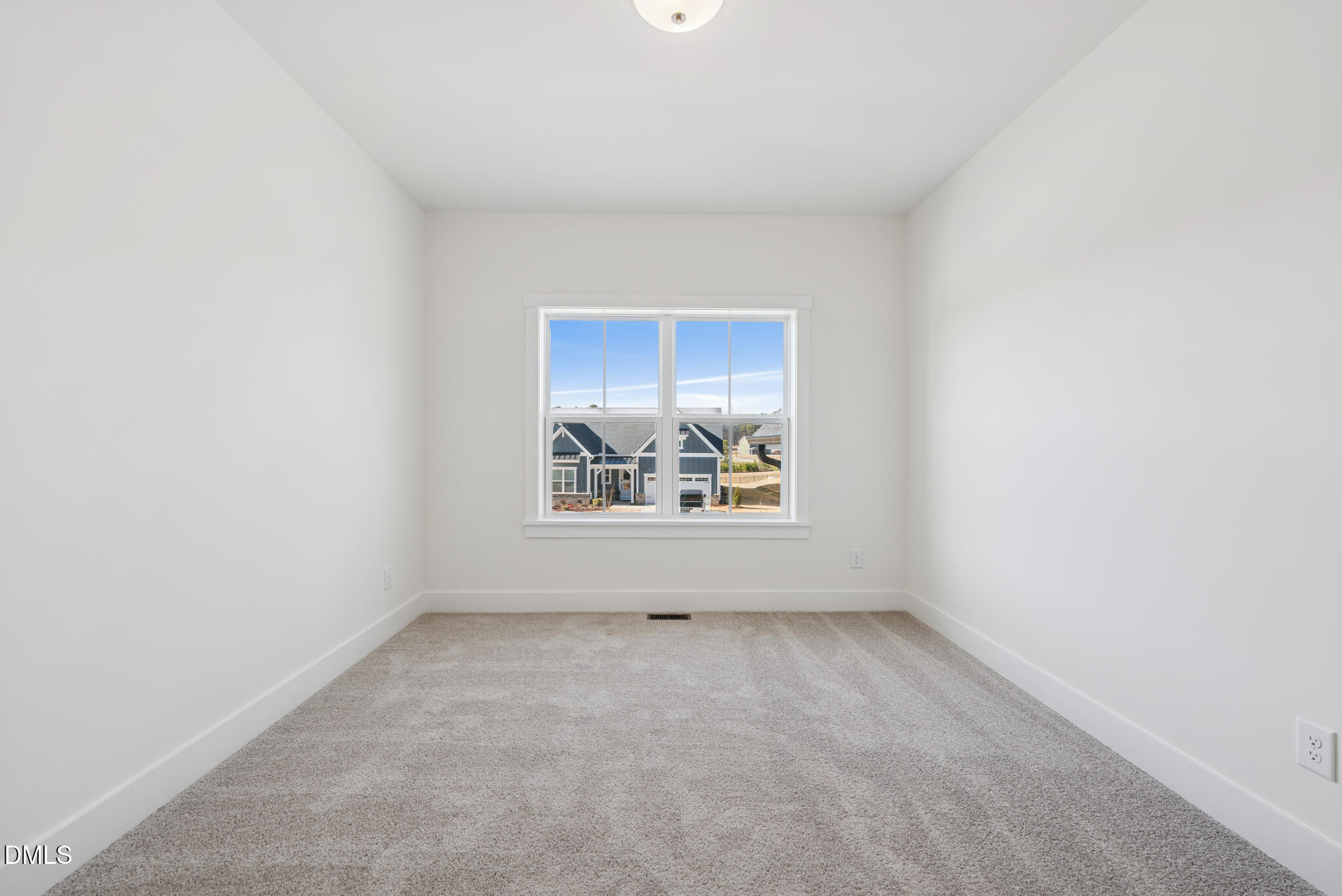 1213 Opal Lane Durham, NC 27705 - Photo 33 of 50 a view of an empty room with a window