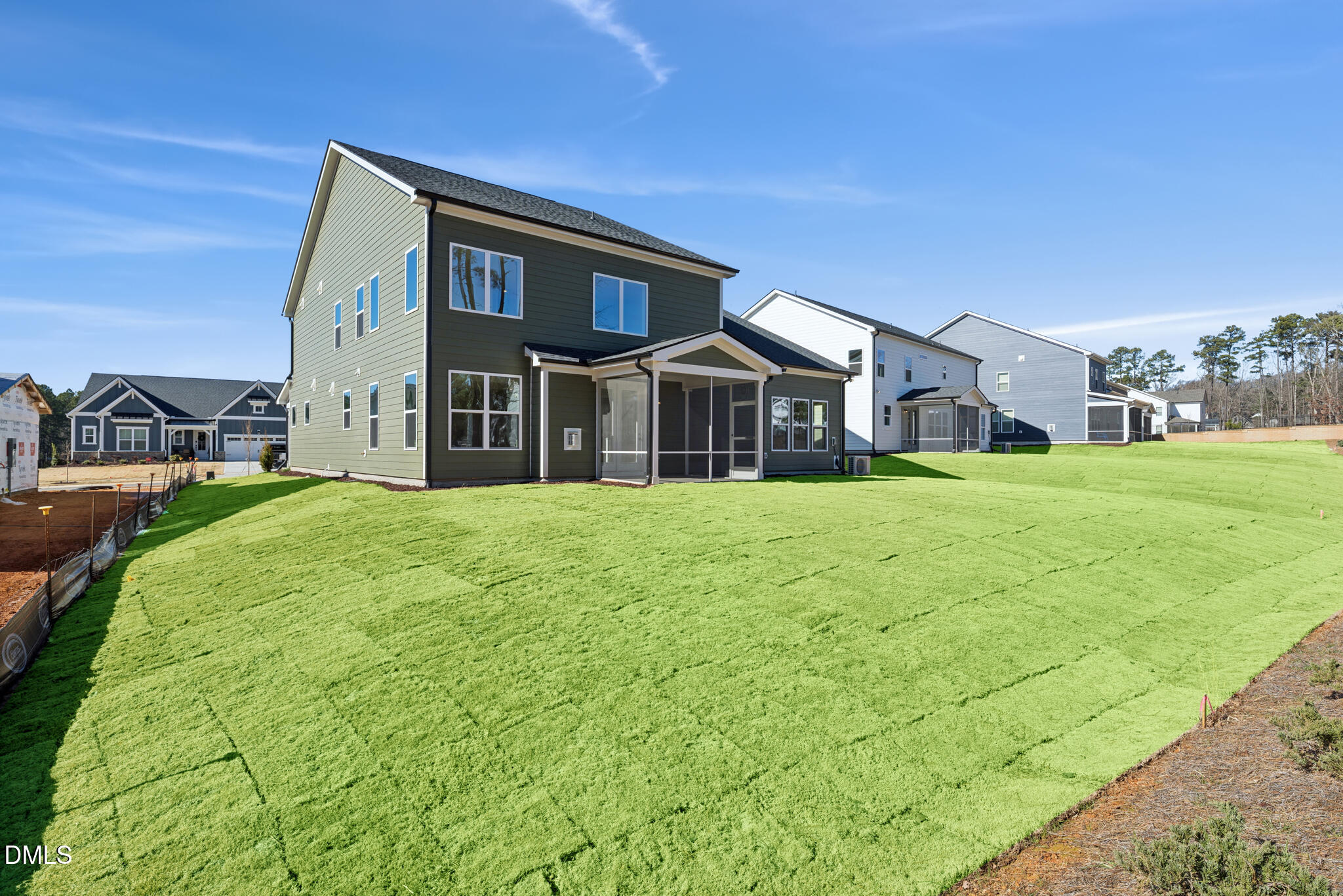 1213 Opal Lane Durham, NC 27705 - Photo 46 of 50 a view of a house with a big yard and large trees