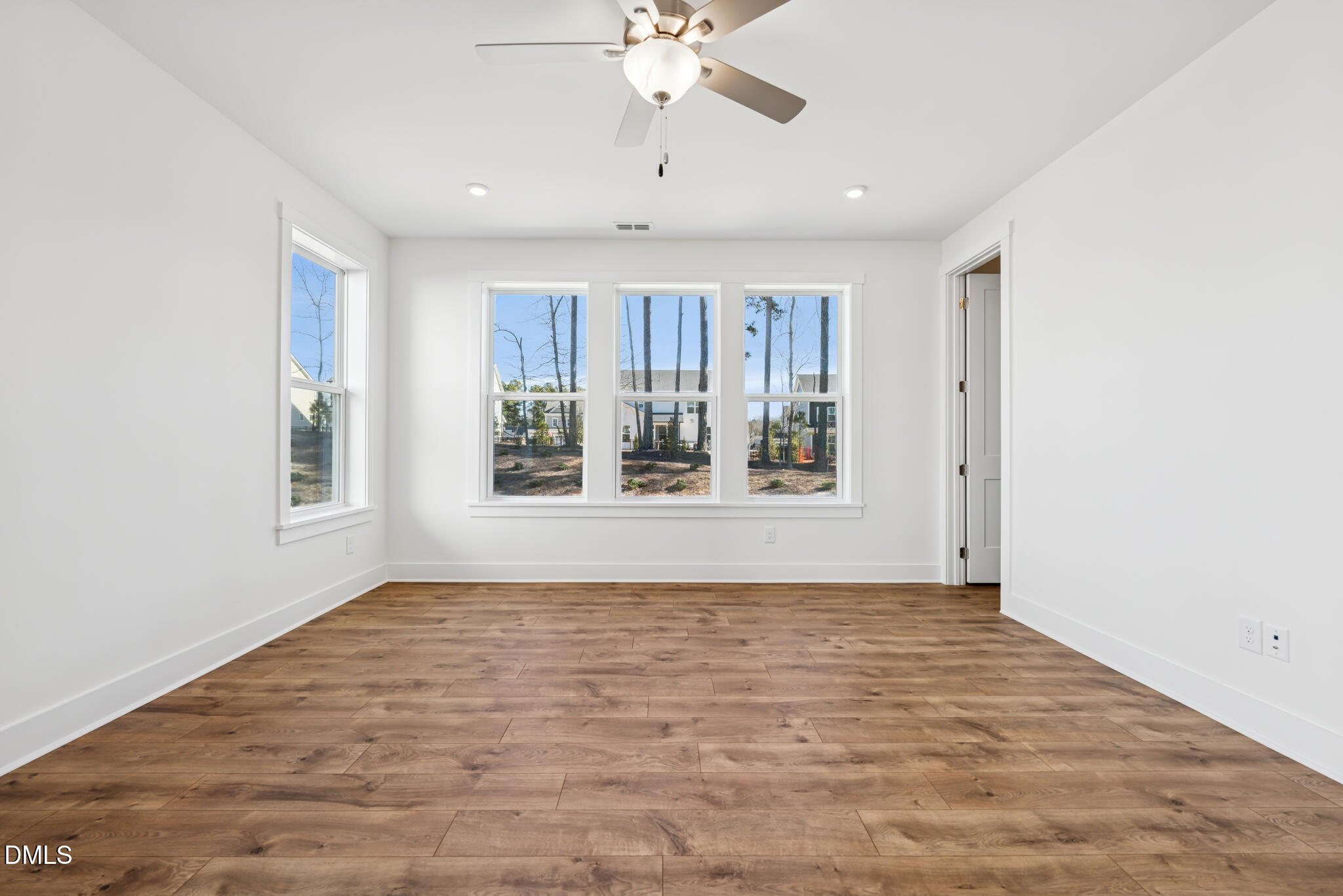 1213 Opal Lane Durham, NC 27705 - Photo 4 of 50 a view of an empty room with a window