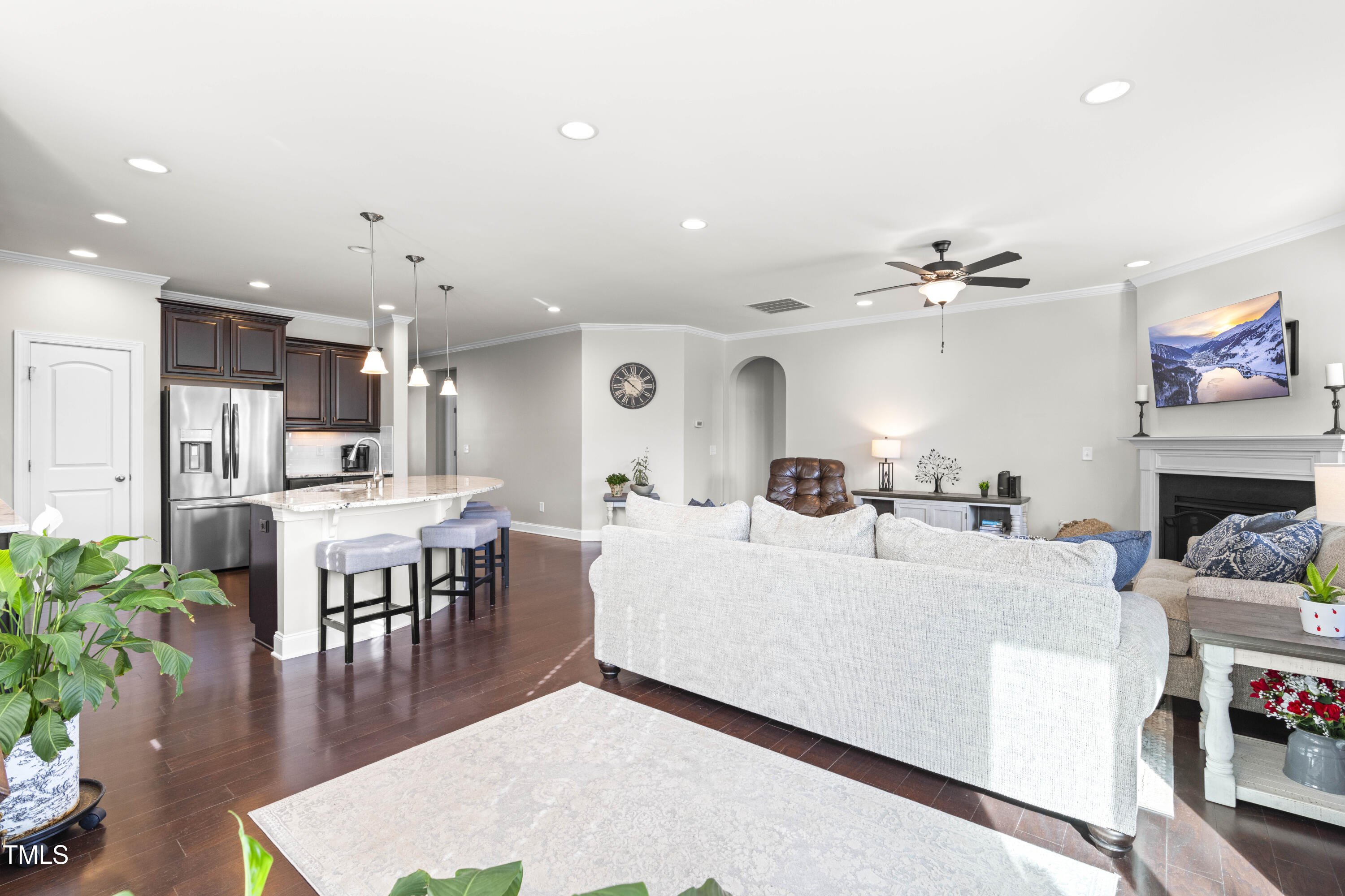1805 Bodwin Lane Apex, NC 27502 - Photo 13 of 43 a living room with furniture and a dining table with kitchen view