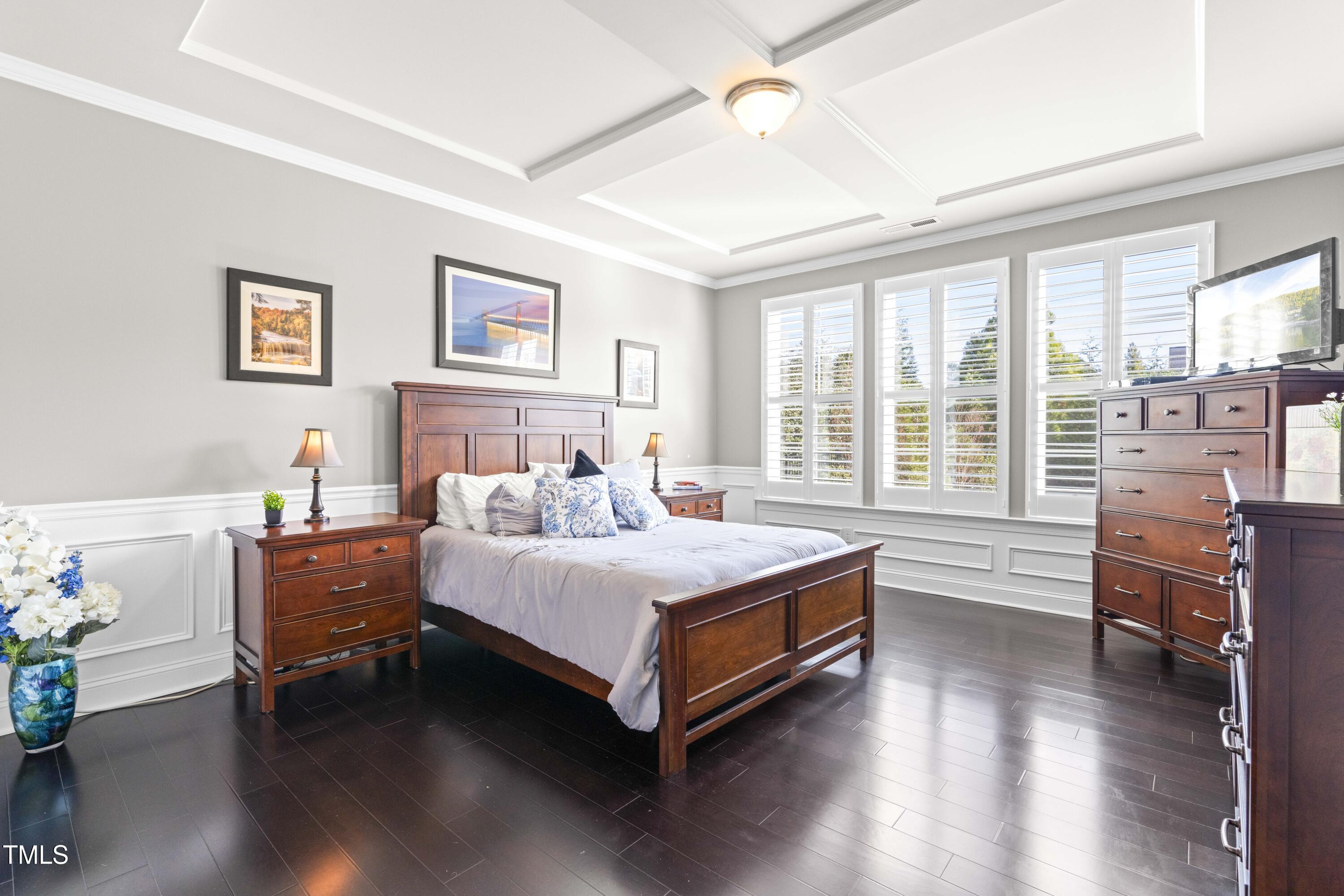 1805 Bodwin Lane Apex, NC 27502 - Photo 16 of 43 a bedroom with a bed and a large window