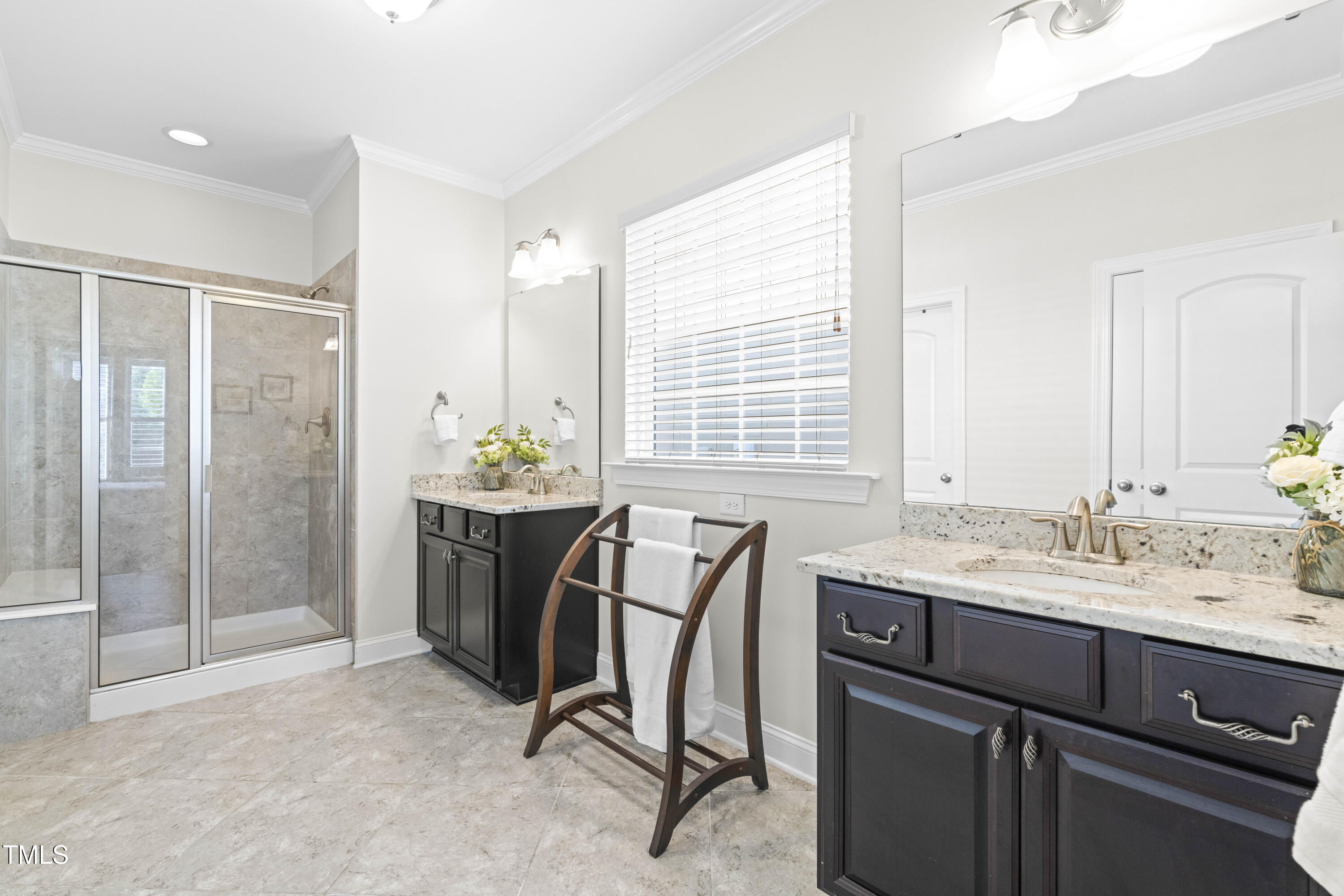 1805 Bodwin Lane Apex, NC 27502 - Photo 18 of 43 a kitchen with a table chairs sink and cabinets