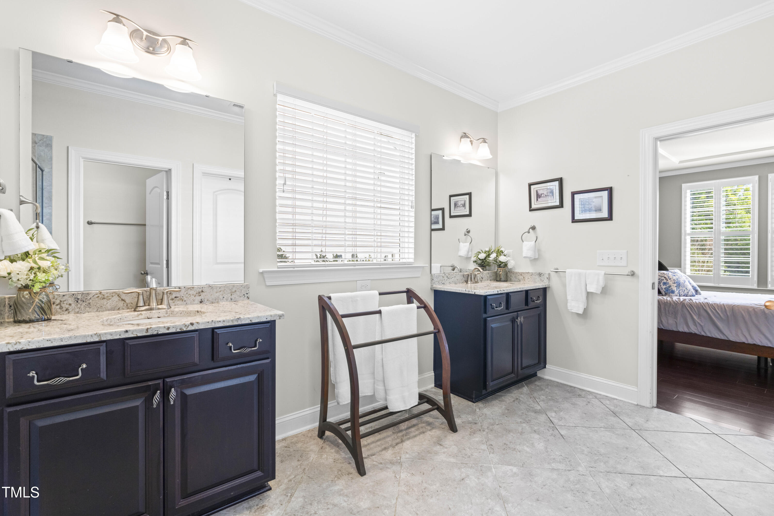 1805 Bodwin Lane Apex, NC 27502 - Photo 19 of 43 a room with a granite countertop furniture and a sink