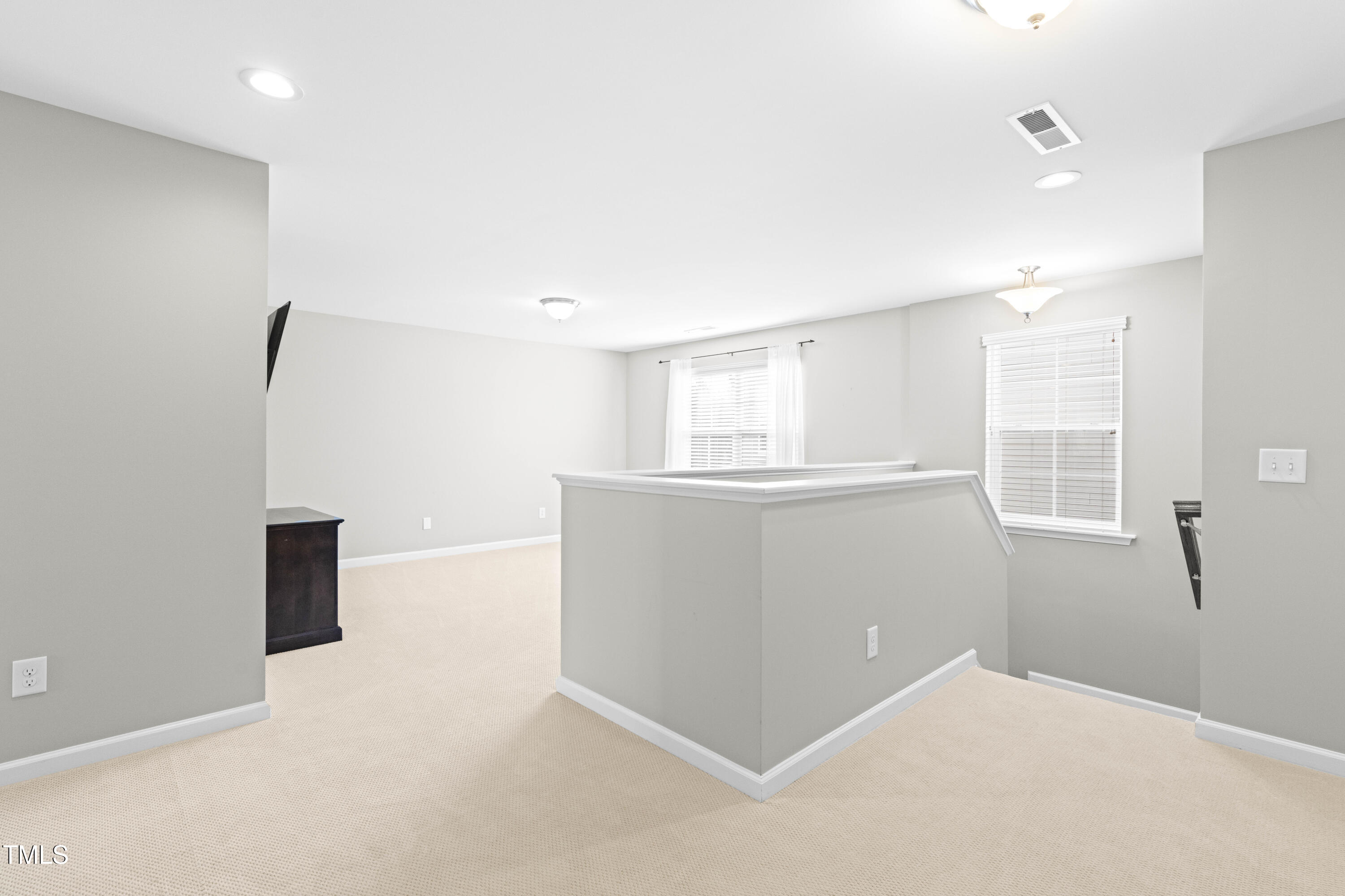 1805 Bodwin Lane Apex, NC 27502 - Photo 22 of 43 a view of an empty room with a window