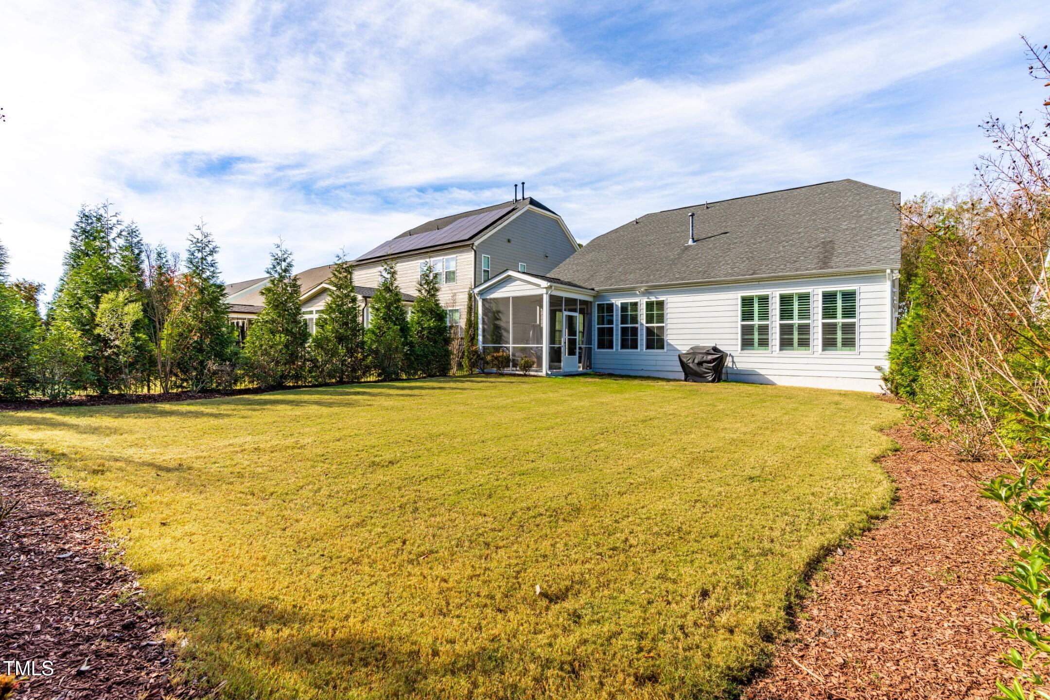 1805 Bodwin Lane Apex, NC 27502 - Photo 30 of 43 a front view of house with yard and swimming pool