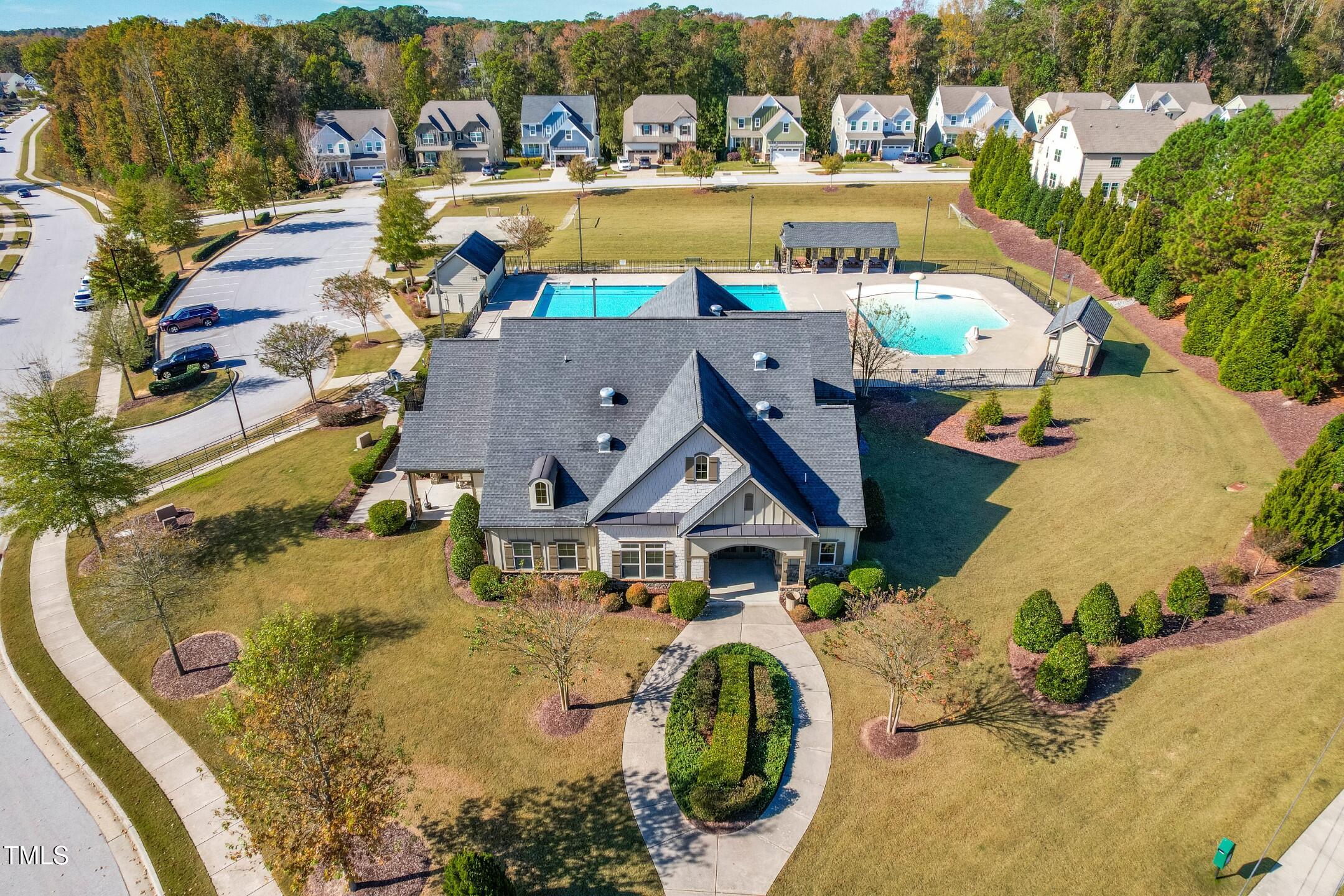 1805 Bodwin Lane Apex, NC 27502 - Photo 37 of 43 an aerial view of a house with swimming pool and ocean view