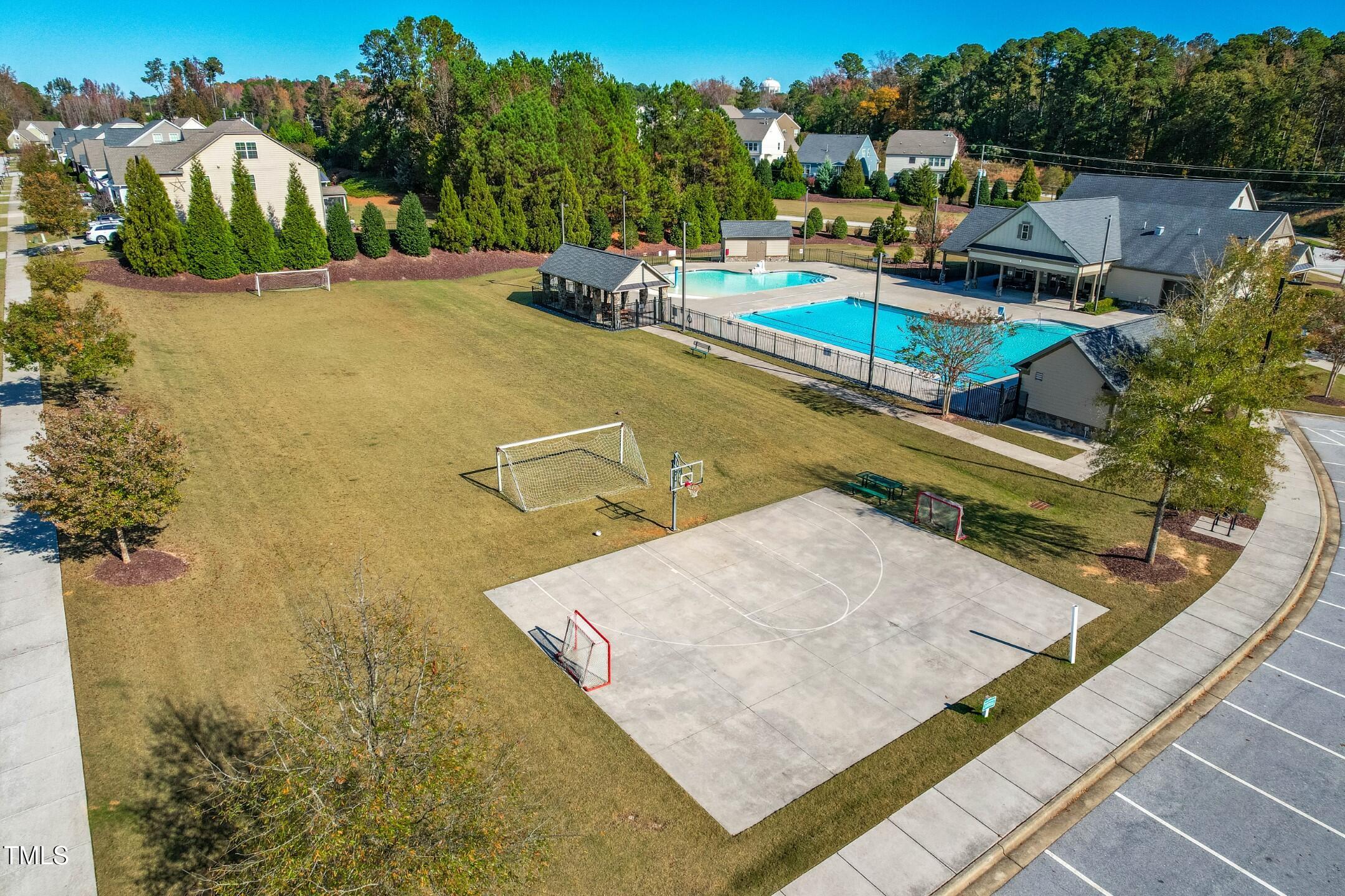 1805 Bodwin Lane Apex, NC 27502 - Photo 40 of 43 a view of a house with a swimming pool