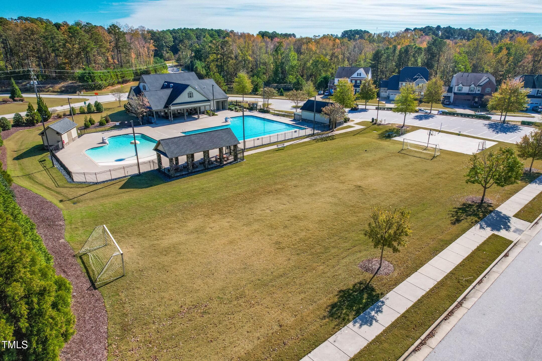 1805 Bodwin Lane Apex, NC 27502 - Photo 41 of 43 a view of a swimming pool with a patio