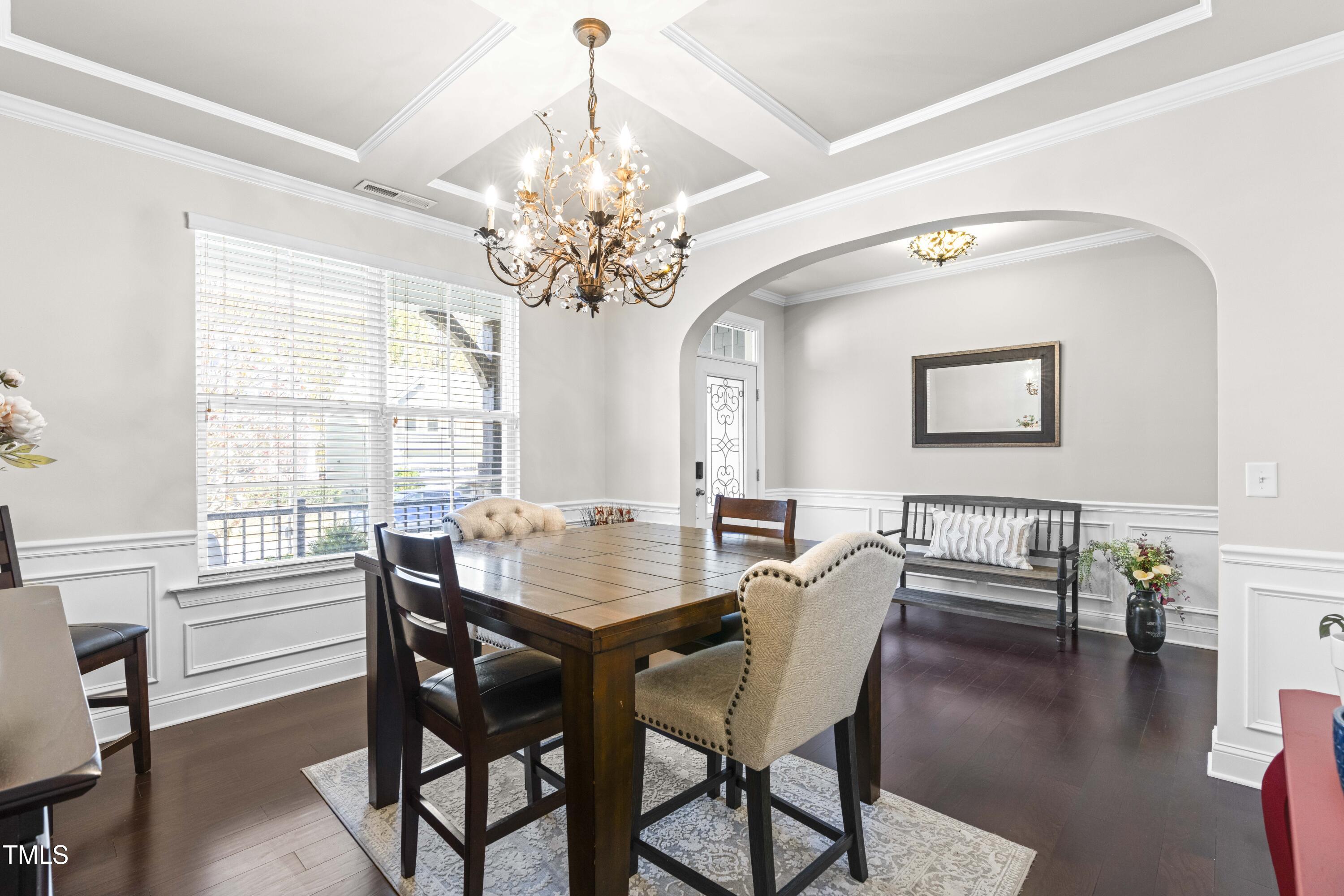 1805 Bodwin Lane Apex, NC 27502 - Photo 6 of 43 a view of a dining room with furniture window and wooden floor