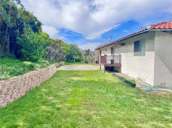 a house view with a garden space