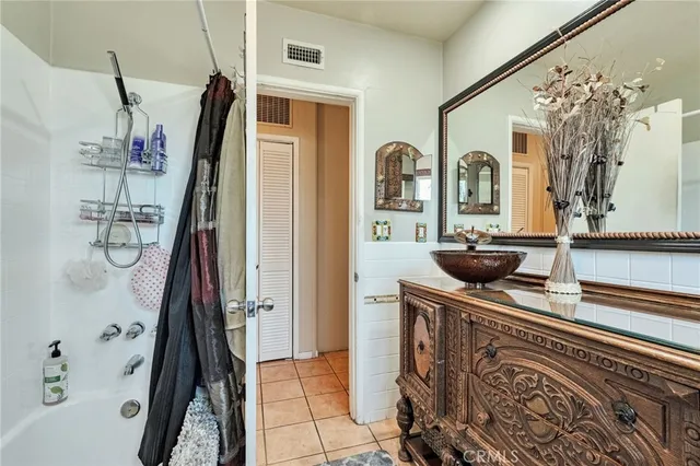a view of living room with furniture and flat screen tv