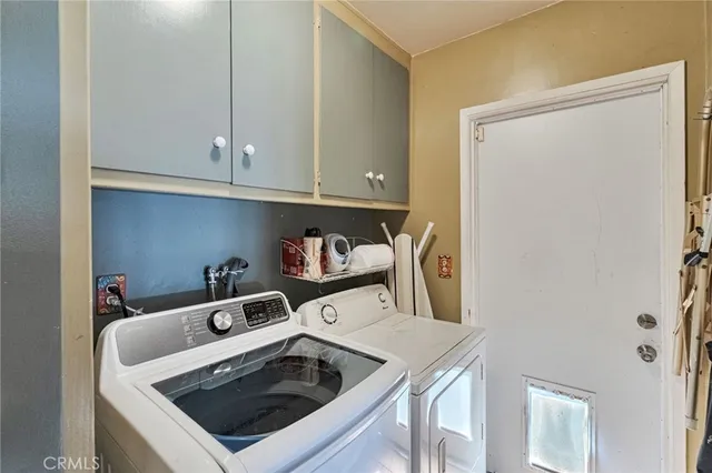 a kitchen with a stove and a refrigerator