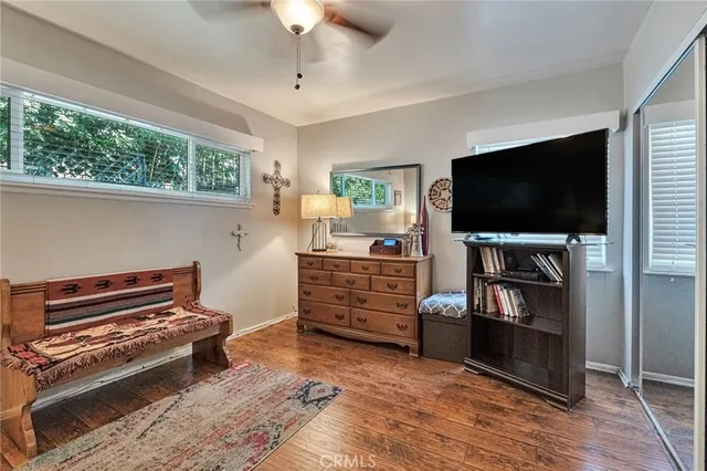a room with furniture and a flat screen tv