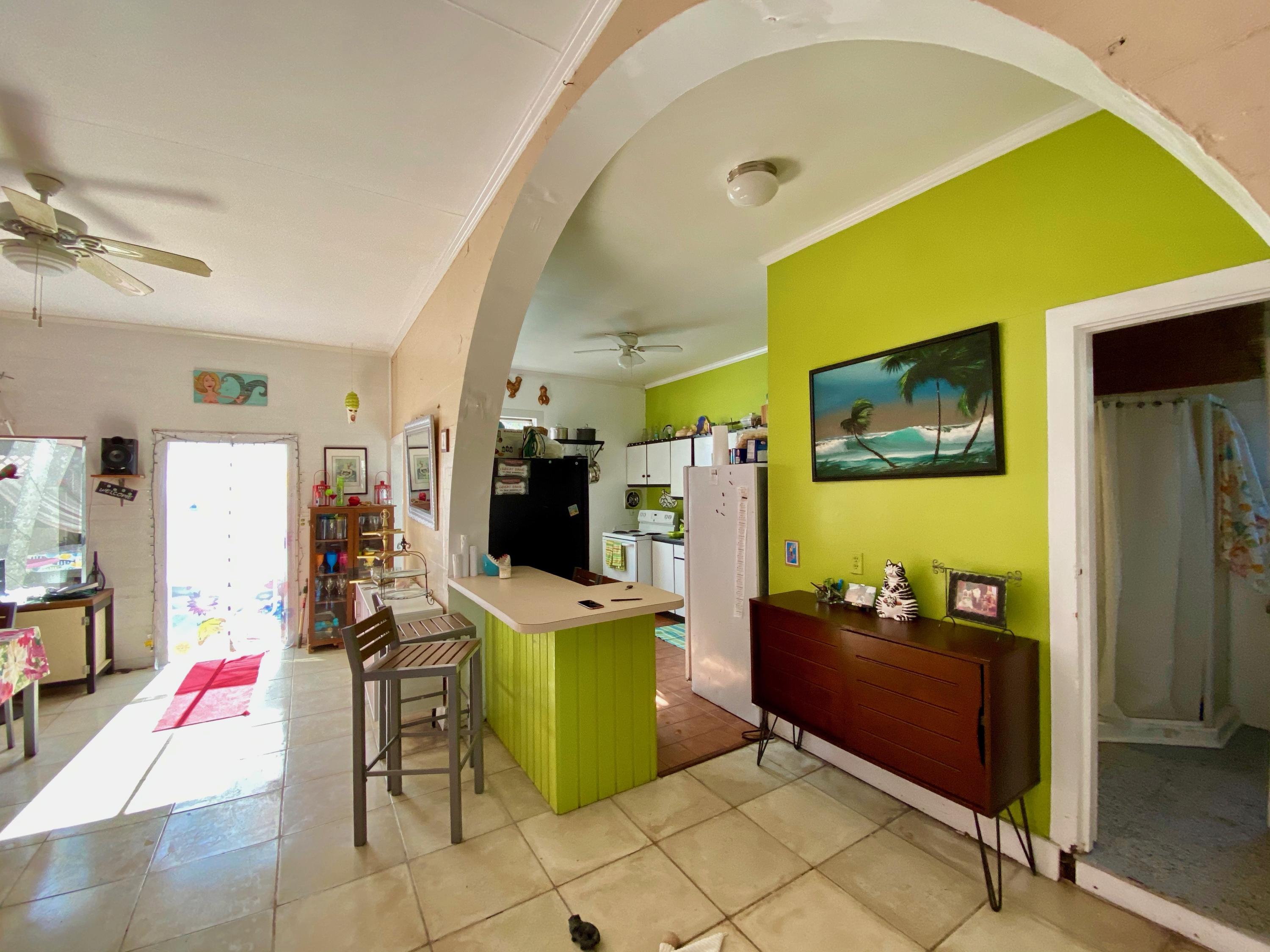 1438 Virginia Street Key West, FL 33040 - Photo 16 of 37 a view of a workspace with furniture