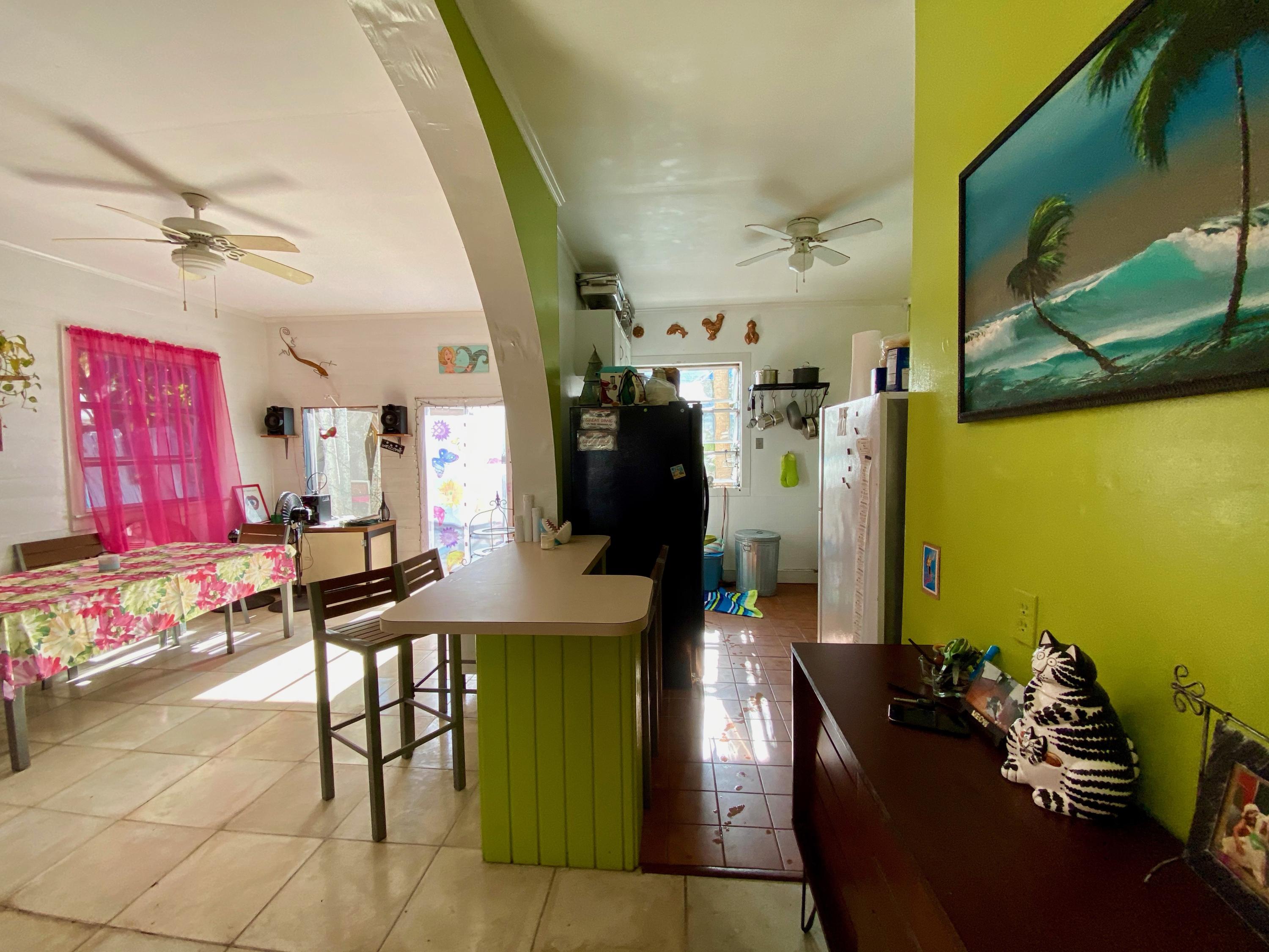 1438 Virginia Street Key West, FL 33040 - Photo 17 of 37 a view of a entryway door with furniture