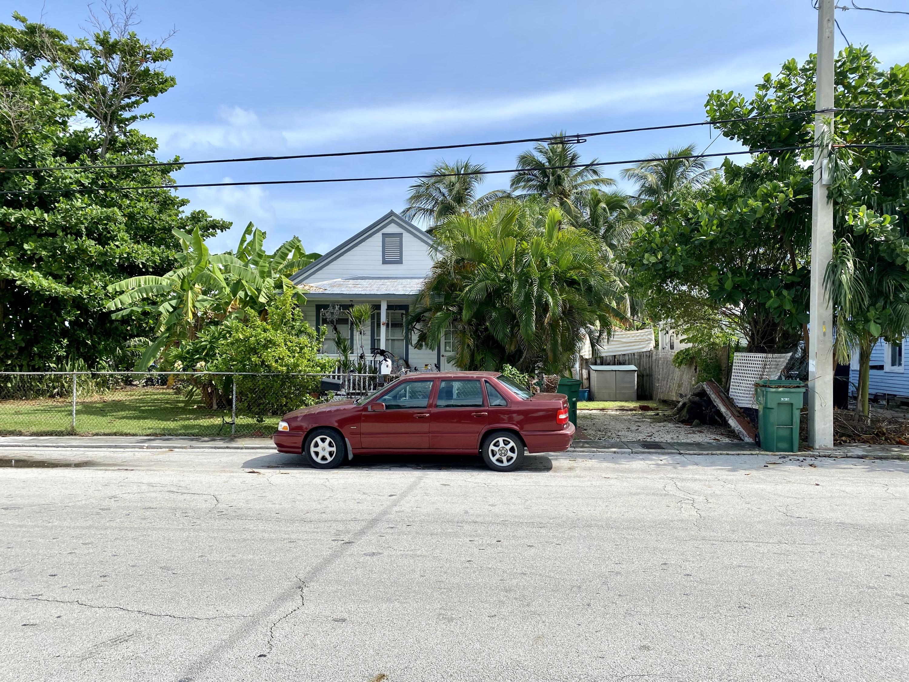 1438 Virginia Street Key West, FL 33040 - Photo 26 of 37 a front view of a house with garden