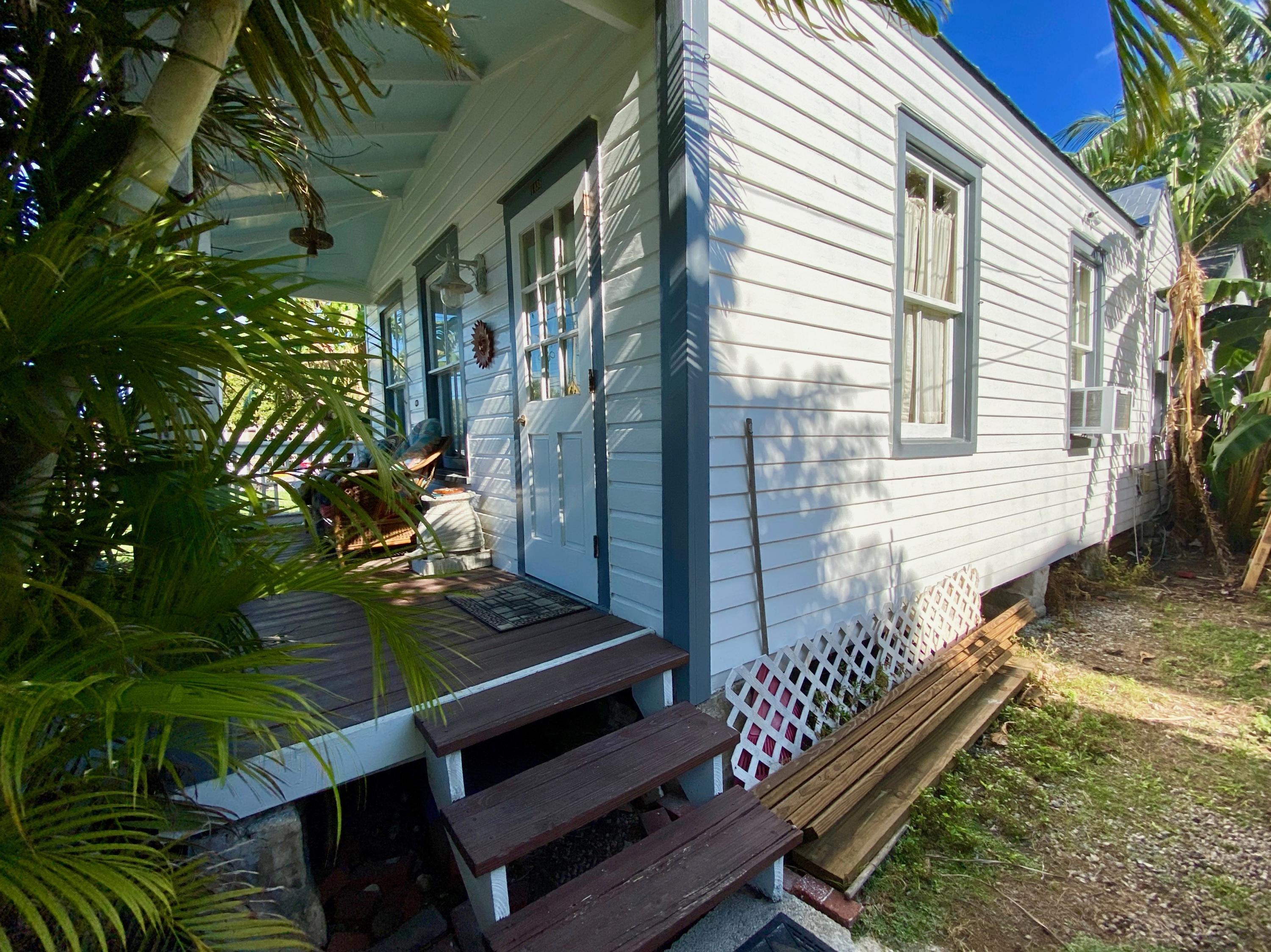 1438 Virginia Street Key West, FL 33040 - Photo 36 of 37 a view of a backyard with sitting area