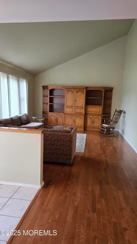 a view of a kitchen with car parked
