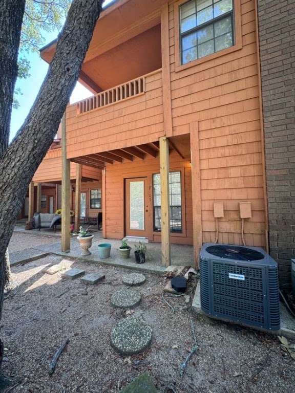 1305 West Villa Maria Road, Unit F105 Bryan, TX 77801 - Photo 3 of 26 Back of house featuring a patio