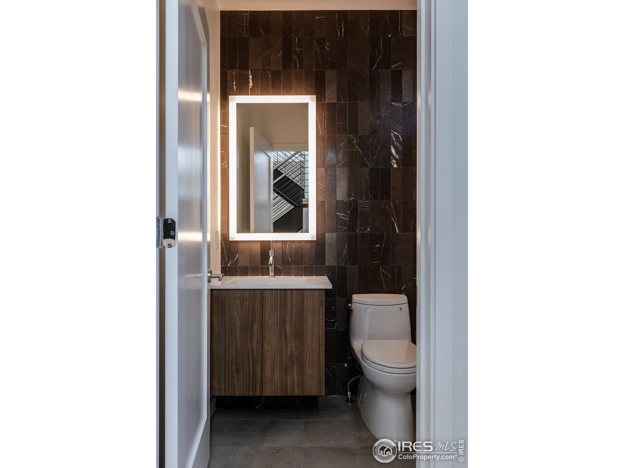 2304 Pearl Street, Unit 2 Boulder, CO 80302 - Photo 10 of 16 a bathroom with a toilet and a sink