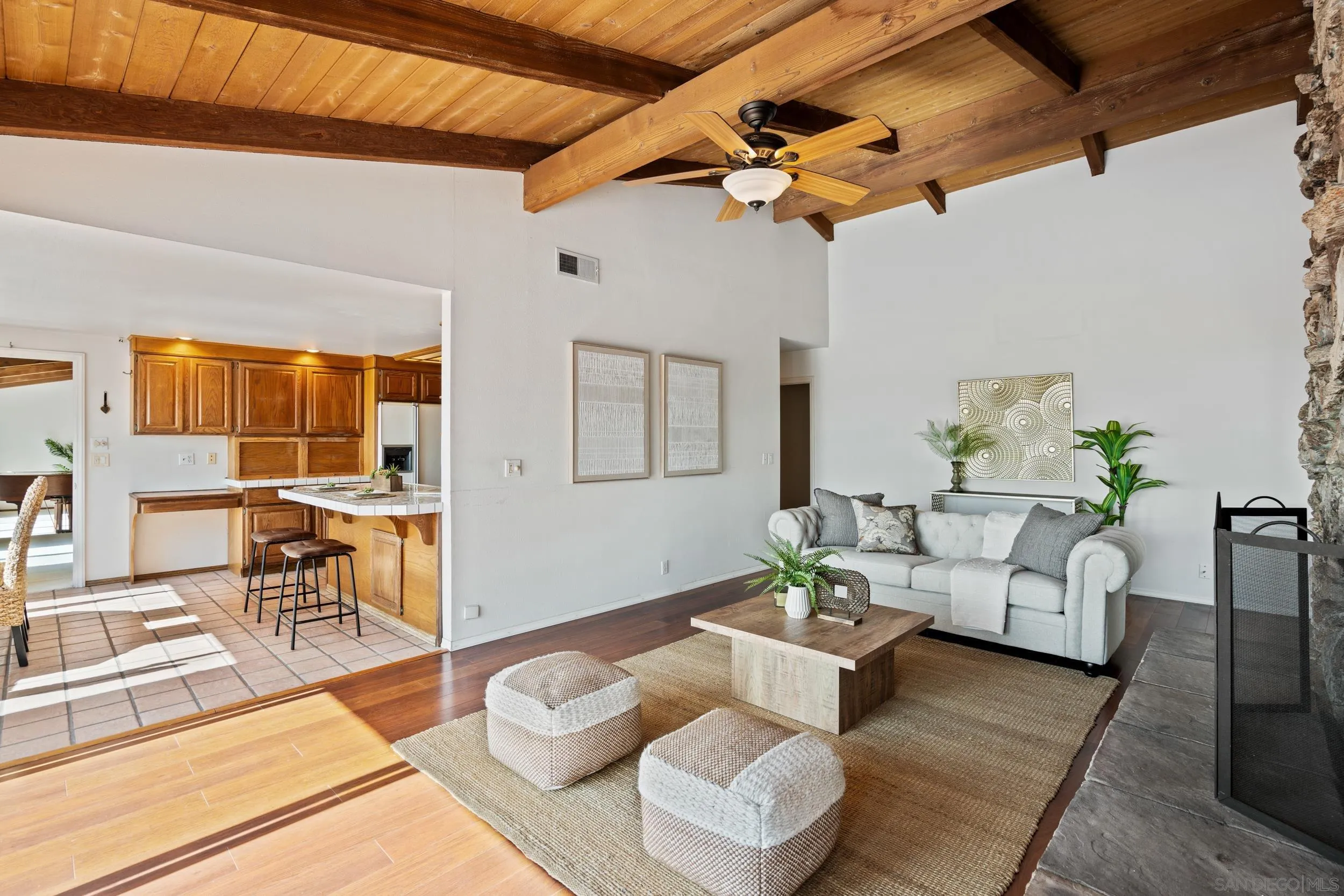 2223 Calle Guaymas La Jolla, CA 92037 - Photo 11 of 32 a living room with furniture and a chandelier