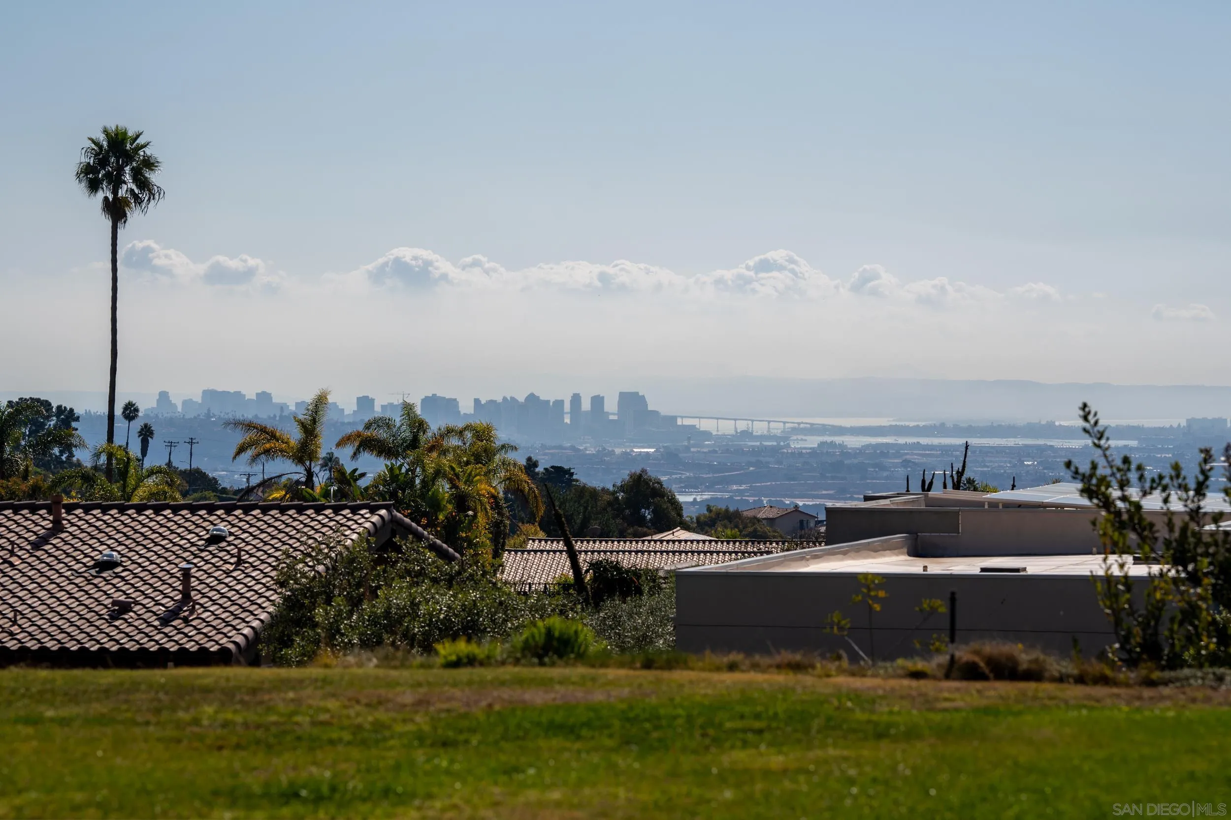 2223 Calle Guaymas La Jolla, CA 92037 - Photo 19 of 32 a view of a house with a yard and a fountain