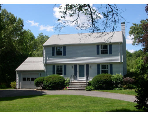 55 Spring Road Weston, MA 02493 - Photo 1 of 1 a front view of a house with a yard
