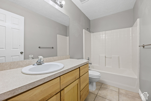 14038 New Saddle Road Draper, UT 84020 - Photo 28 of 46 Light-toned wood-finish vanity with an integrated sink and chrome faucet