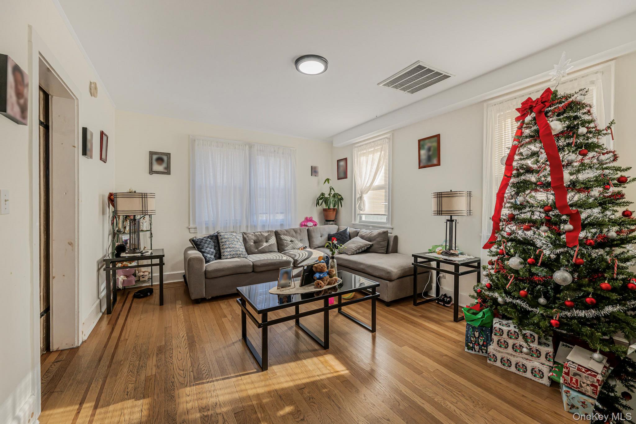 168 Stephenson Boulevard New Rochelle, NY 10801 - Photo 12 of 21 Living area with wood-type flooring