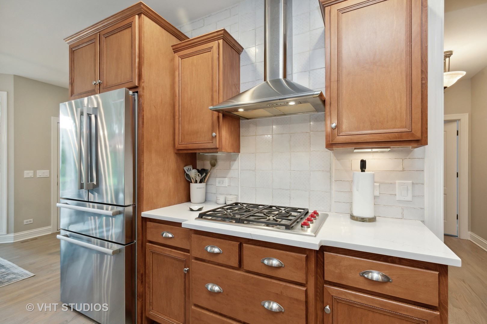 8902 Voss Road Marengo, IL 60152 - Photo 12 of 35 a kitchen with a refrigerator and a stove top oven