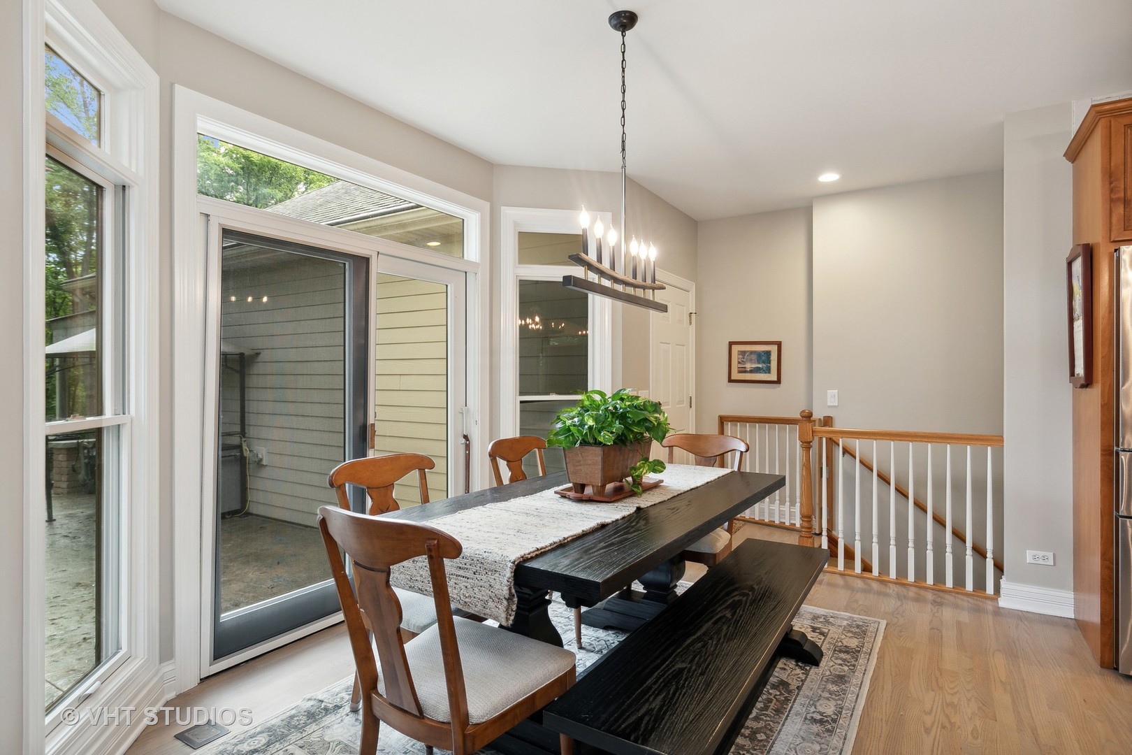 8902 Voss Road Marengo, IL 60152 - Photo 13 of 35 a view of a dining room with furniture window and wooden floor