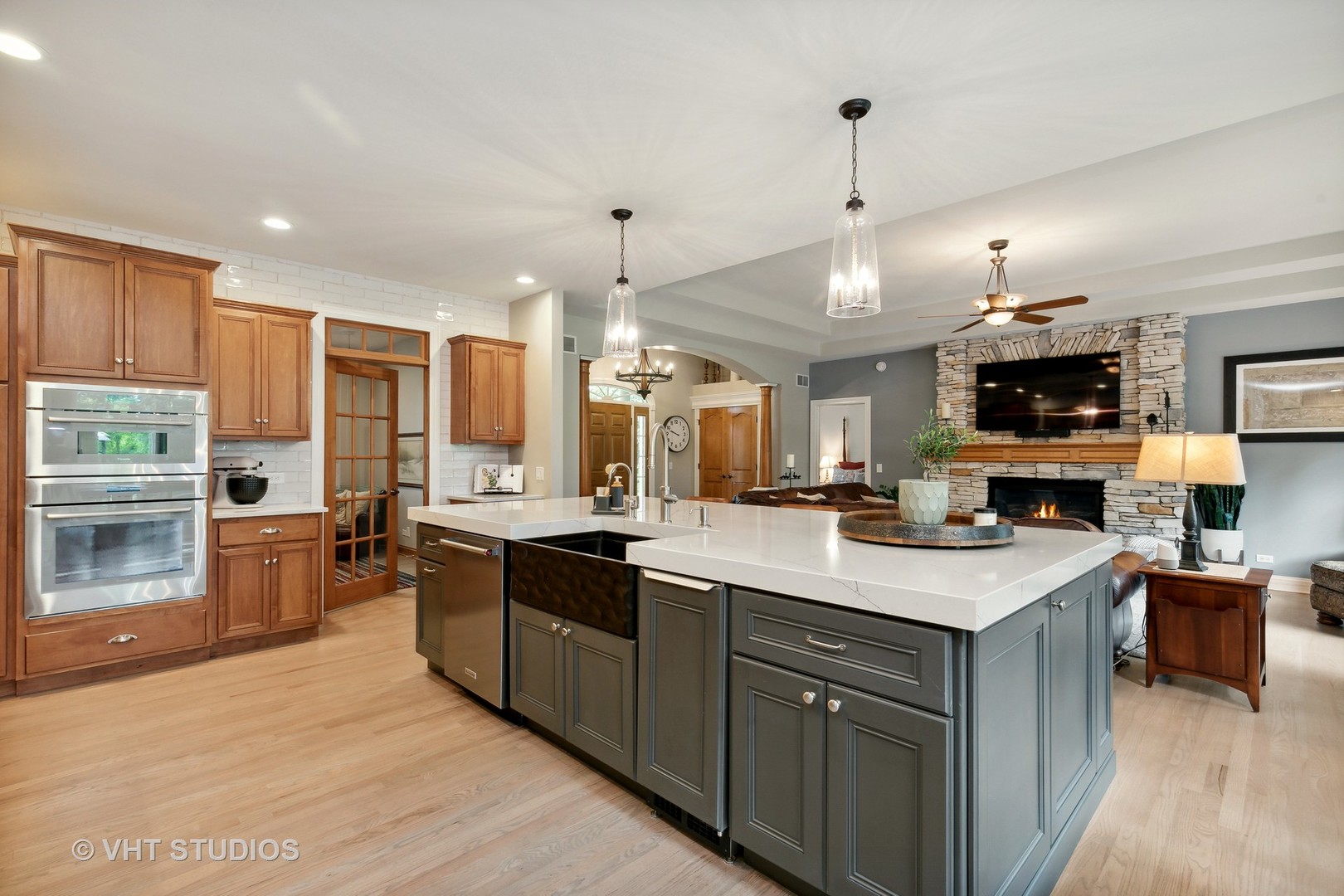 8902 Voss Road Marengo, IL 60152 - Photo 15 of 35 a kitchen with a sink stove top oven and refrigerator