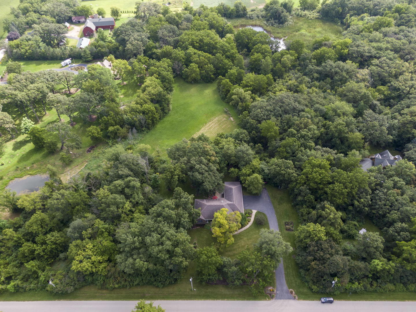8902 Voss Road Marengo, IL 60152 - Photo 32 of 35 an aerial view of residential house with outdoor space and swimming pool