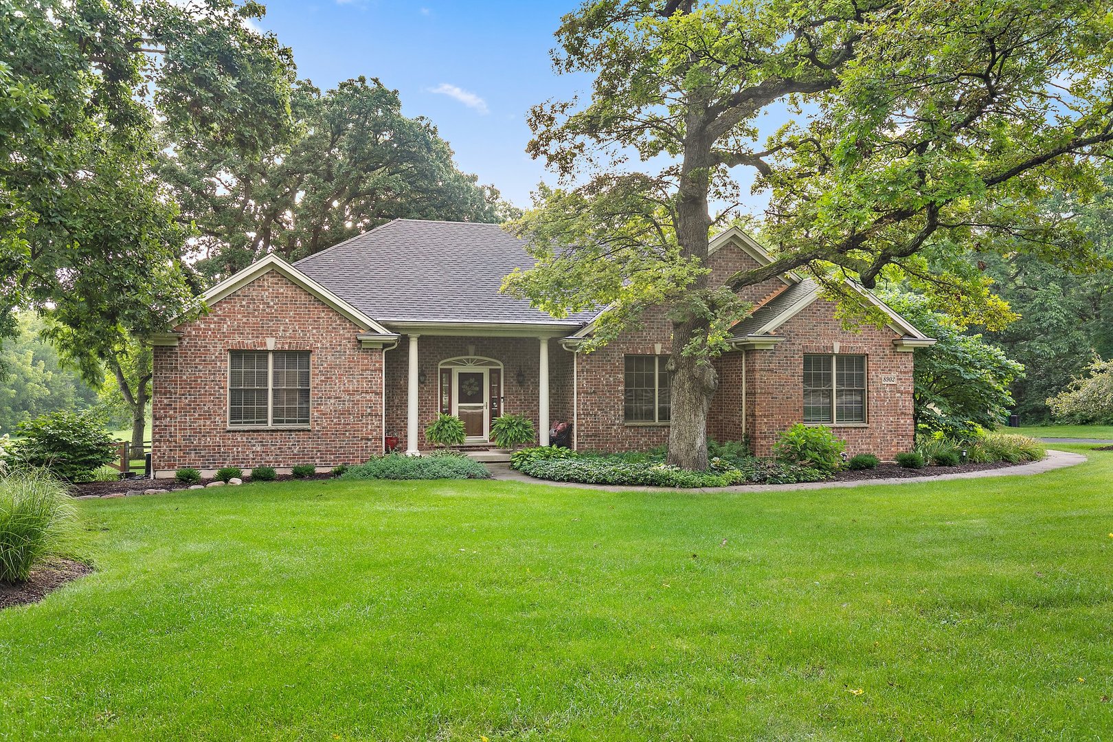 8902 Voss Road Marengo, IL 60152 - Photo 35 of 35 a front view of a house with a yard and garage